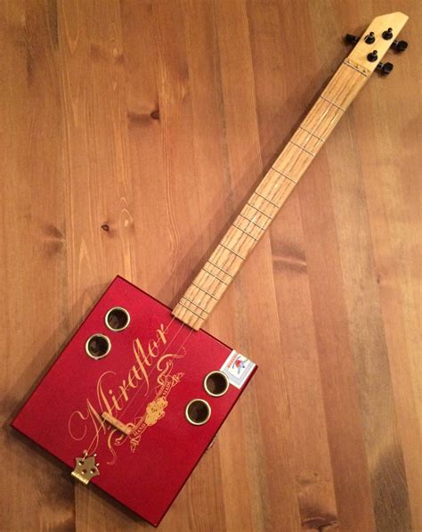 acoustic vs electric cigar box guitar|cigar box acoustic strings.